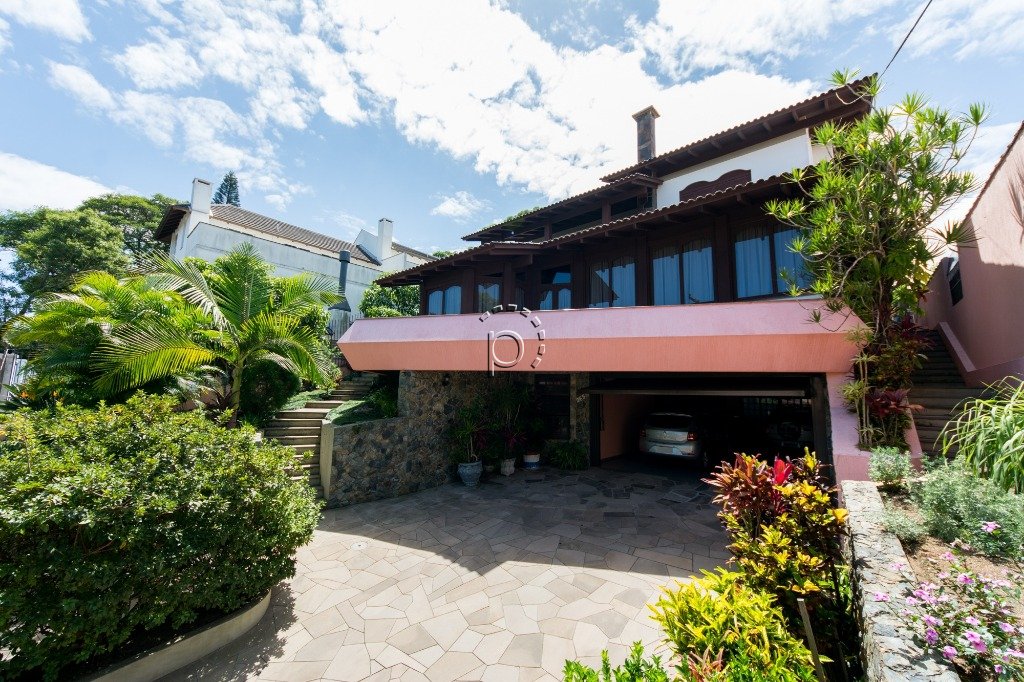 Casa à venda com 646m², 4 quartos, 2 suítes, 3 vagas no bairro Jardim Isabel em Porto Alegre