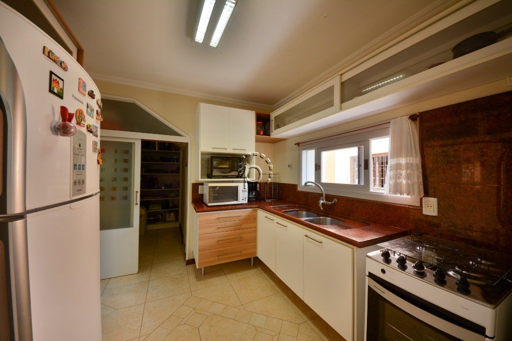 Casa à venda com 394m², 4 quartos, 2 suítes, 5 vagas no bairro Vila Assunção em Porto Alegre - Foto 11