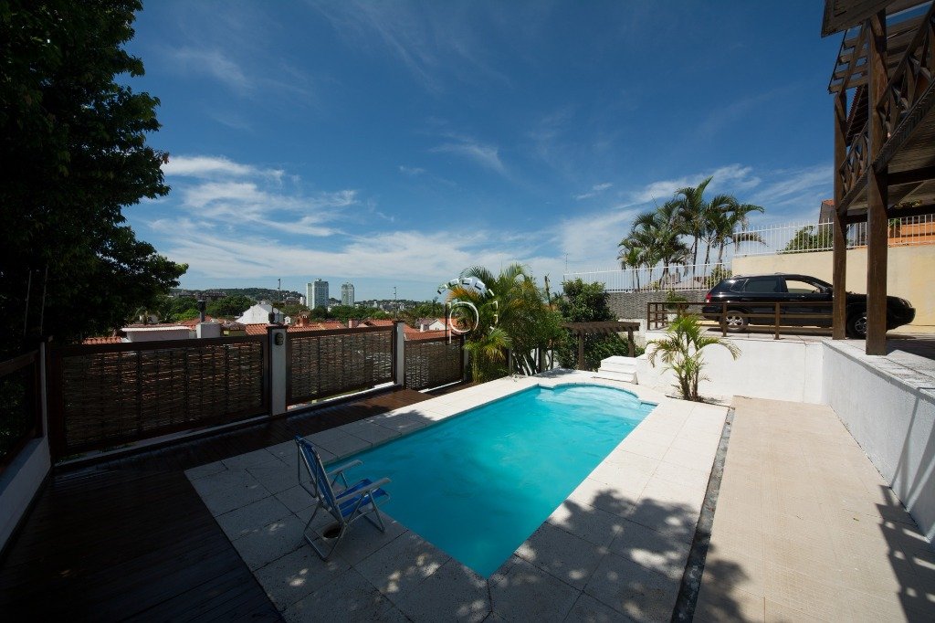 Casa à venda com 394m², 4 quartos, 2 suítes, 5 vagas no bairro Vila Assunção em Porto Alegre - Foto 24