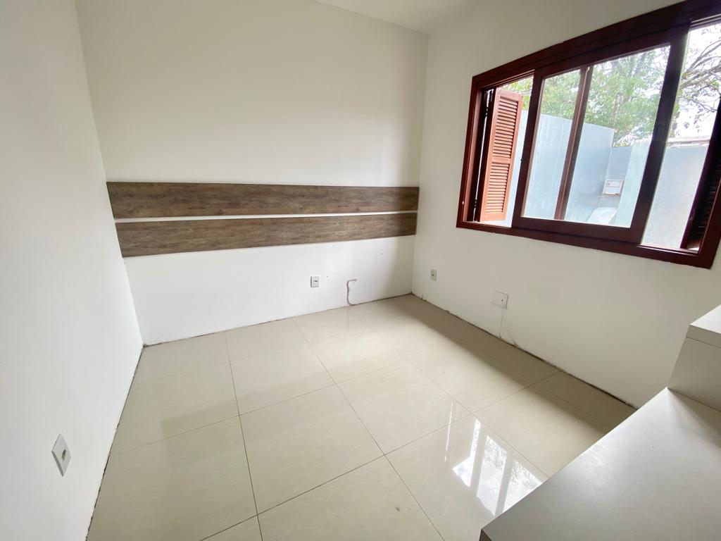 Casa à venda com 74m², 3 quartos, 1 suíte, 2 vagas no bairro Hípica em Porto Alegre - Foto 5