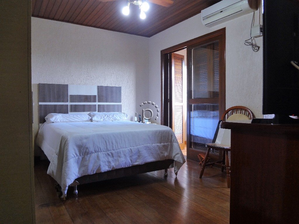 Casa à venda com 265m², 4 quartos, 5 vagas no bairro Cavalhada em Porto Alegre - Foto 9