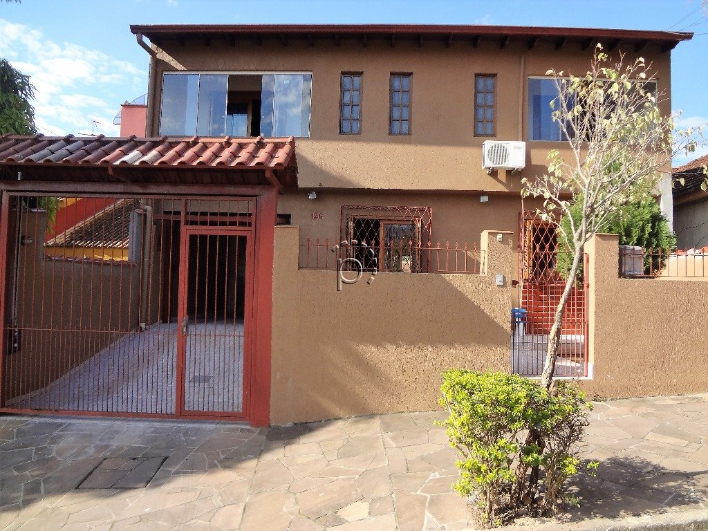 Casa à venda com 265m², 4 quartos, 5 vagas no bairro Cavalhada em Porto Alegre