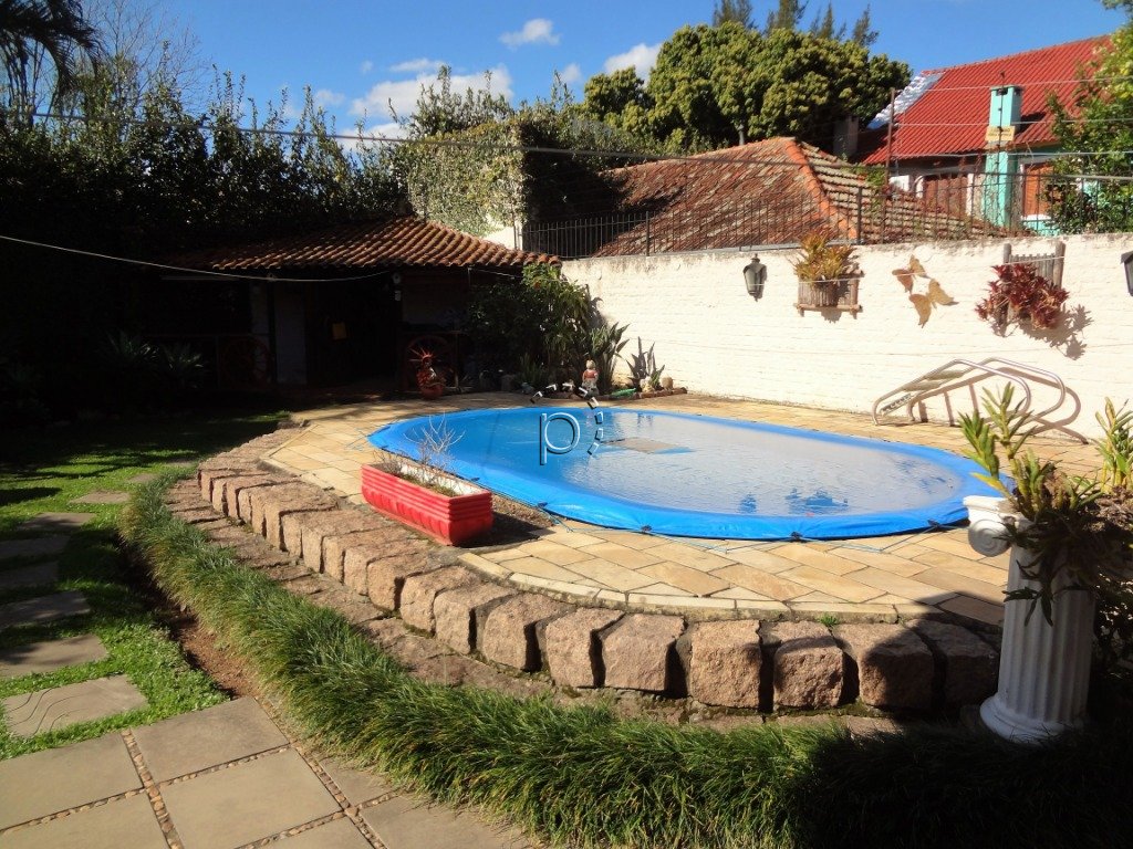 Casa à venda com 236m², 3 quartos, 1 suíte, 3 vagas no bairro Guarujá em Porto Alegre - Foto 22