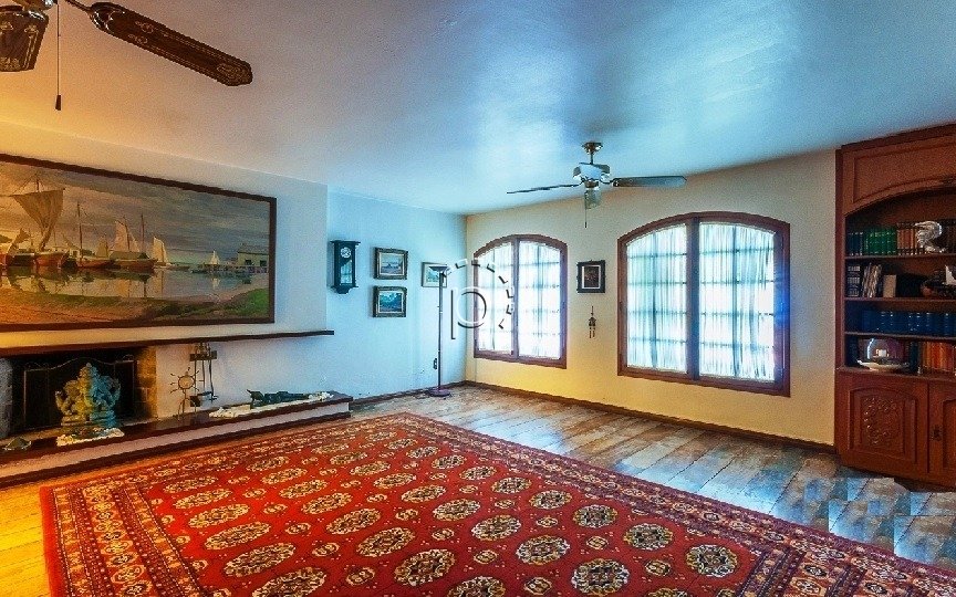 Casa à venda com 360m², 6 quartos, 2 suítes, 4 vagas no bairro Vila Assunção em Porto Alegre - Foto 2