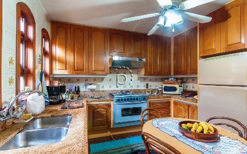 Casa à venda com 360m², 6 quartos, 2 suítes, 4 vagas no bairro Vila Assunção em Porto Alegre - Foto 4