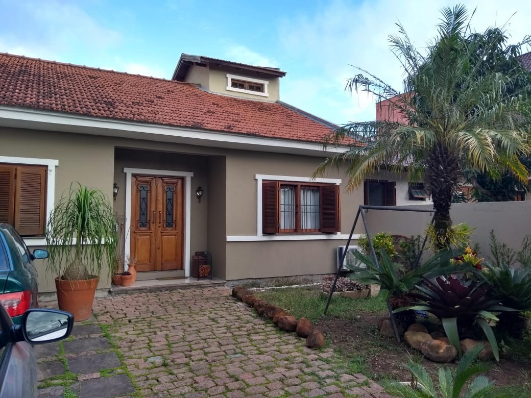 Casa à venda com 107m², 3 quartos, 1 suíte, 2 vagas no bairro Espirito Santo em Porto Alegre