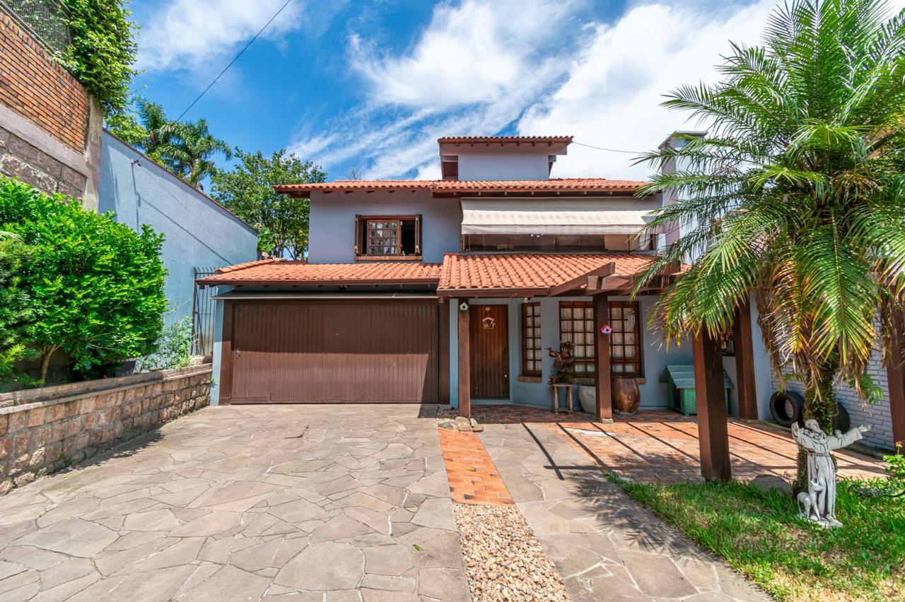 Casa à venda com 279m², 4 quartos no bairro Jardim Isabel em Porto Alegre