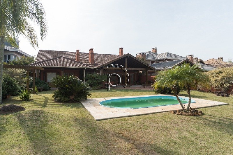 Casa em Condomínio para alugar com 484m², 4 quartos no bairro Terra Ville em Porto Alegre - Foto 2