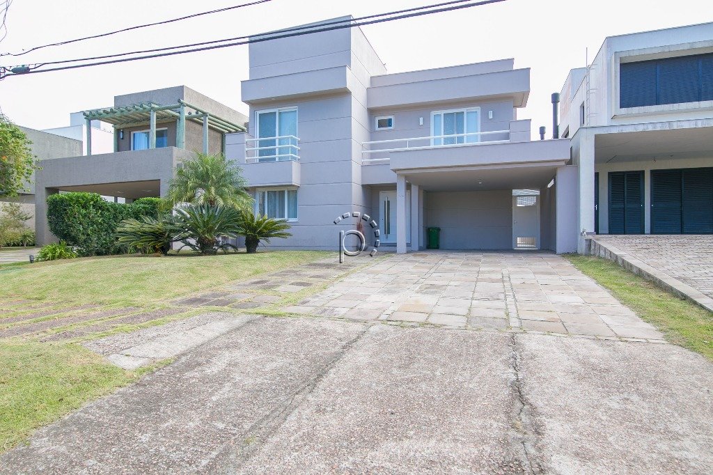Casa em Condomínio para alugar com 455m², 4 quartos, 4 suítes, 3 vagas no bairro Terra Ville em Porto Alegre