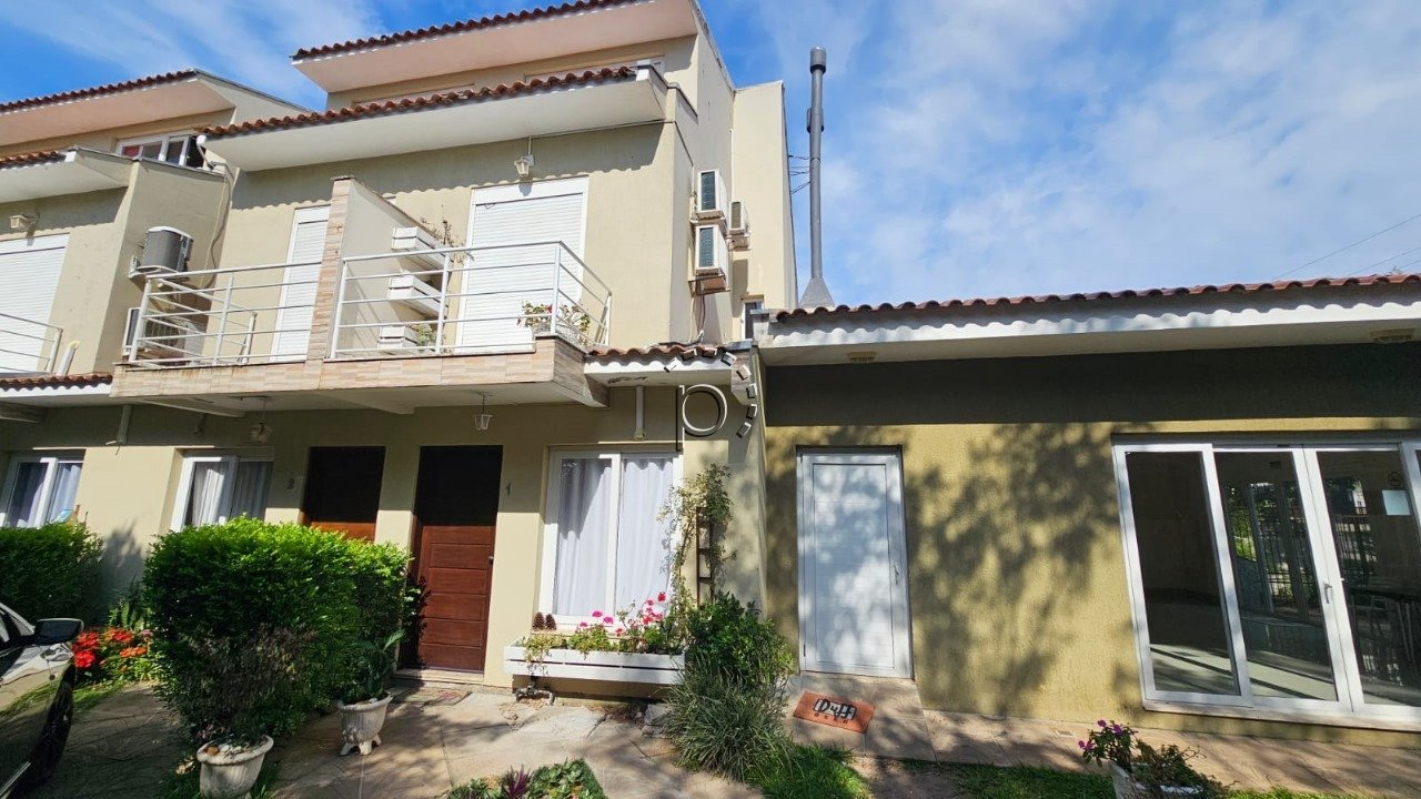 Casa em Condomínio para alugar com 87m², 2 quartos, 1 vaga no bairro Hípica em Porto Alegre