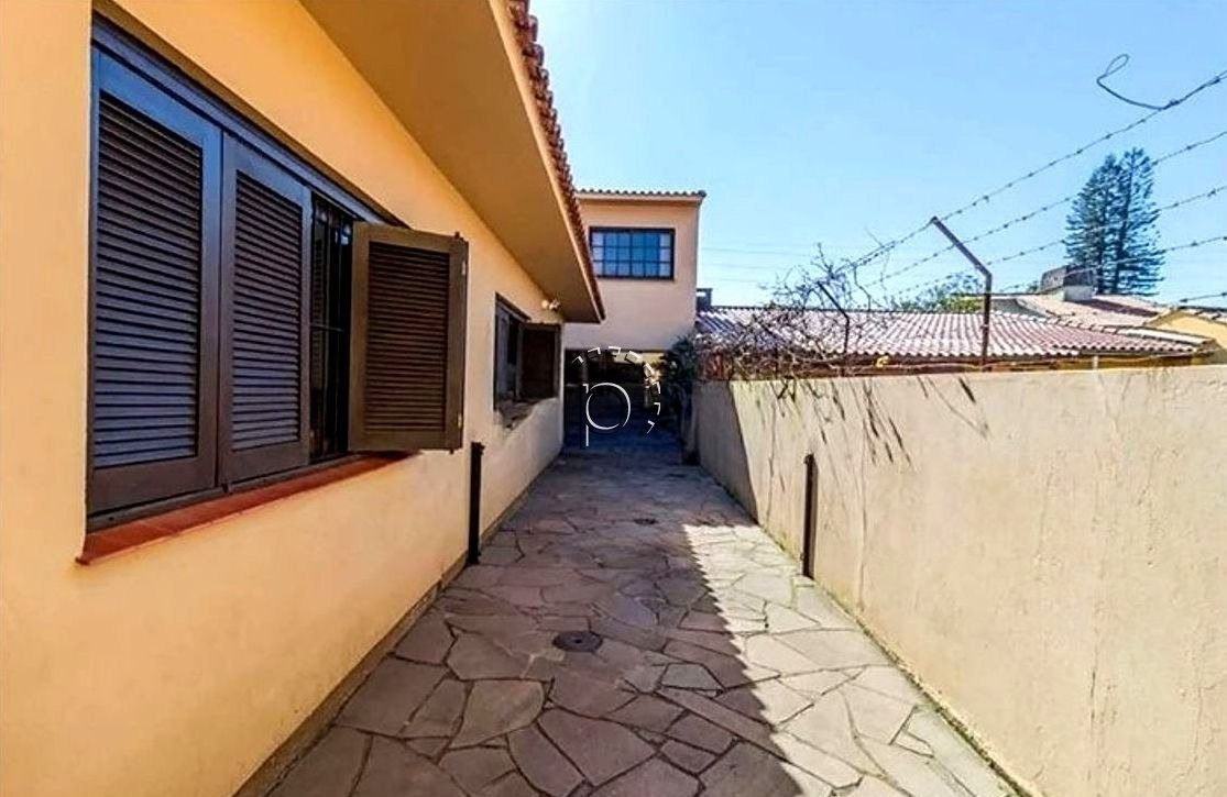 Casa à venda com 280m², 3 quartos, 1 suíte, 3 vagas no bairro Espirito Santo em Porto Alegre - Foto 16