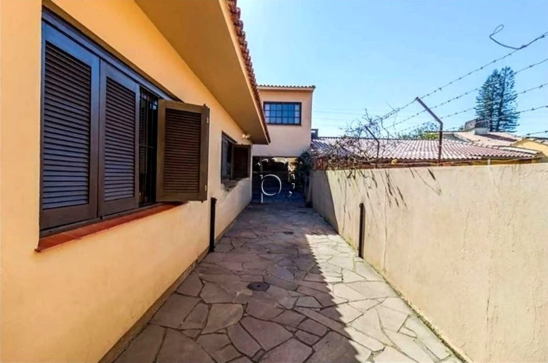 Casa à venda com 280m², 3 quartos, 1 suíte, 3 vagas no bairro Espirito Santo em Porto Alegre - Foto 15