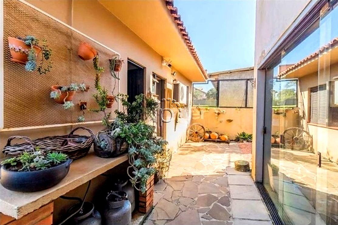Casa à venda com 280m², 3 quartos, 1 suíte, 3 vagas no bairro Espirito Santo em Porto Alegre - Foto 17