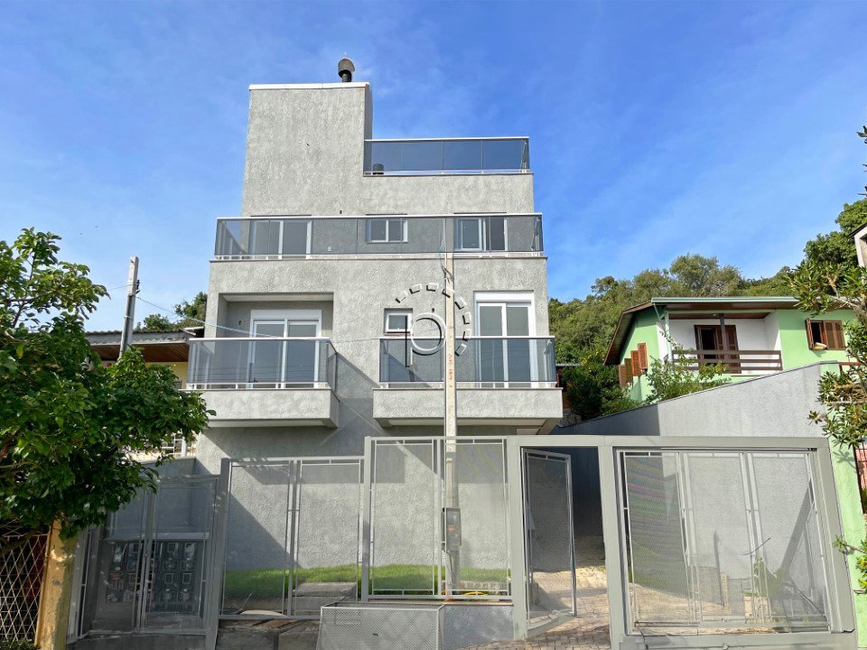 Casa em Condomínio à venda com 225m², 3 quartos, 1 suíte, 3 vagas no bairro Tristeza em Porto Alegre