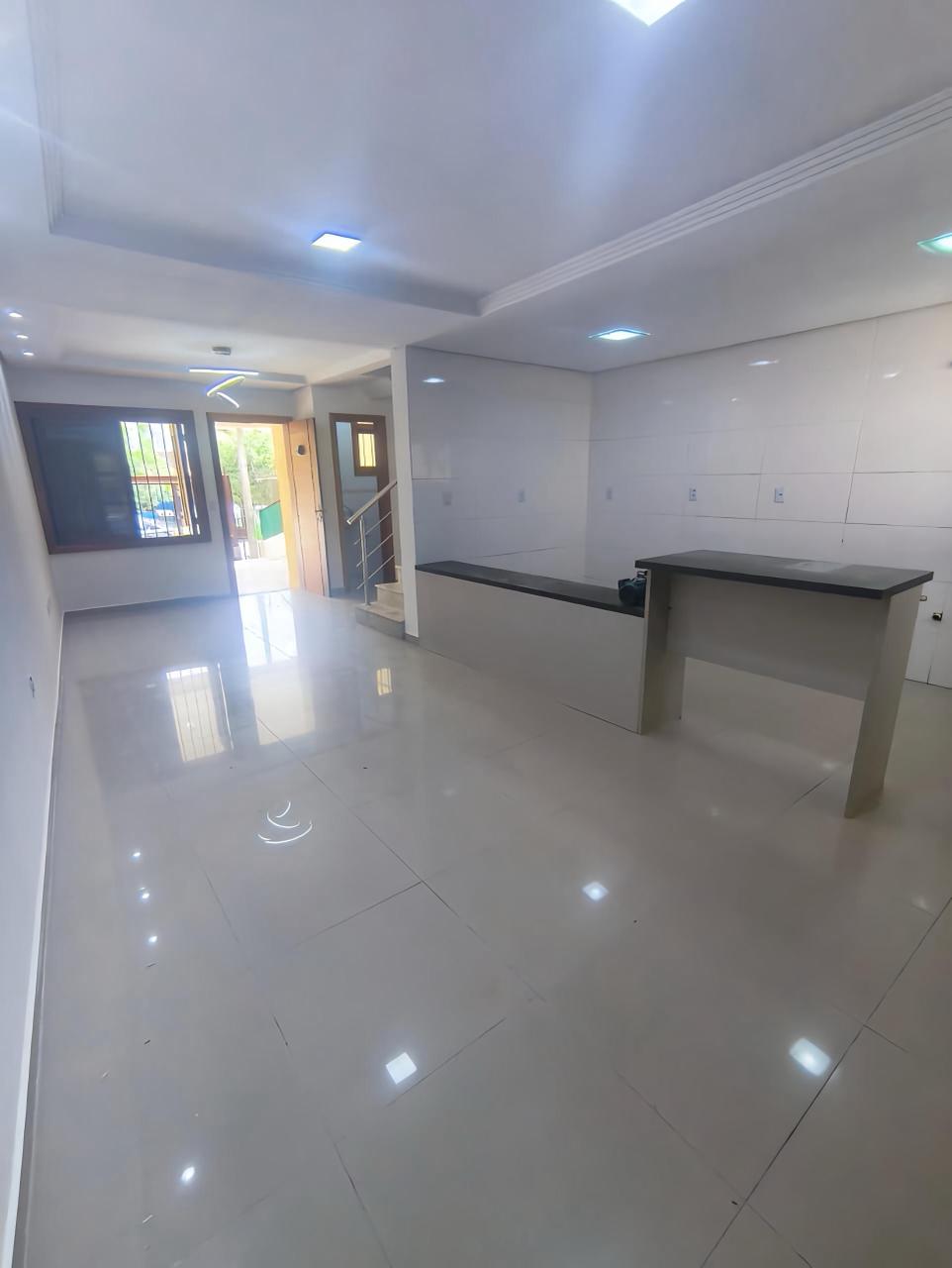 Casa à venda com 130m², 3 quartos, 1 suíte, 3 vagas no bairro Guarujá em Porto Alegre - Foto 2
