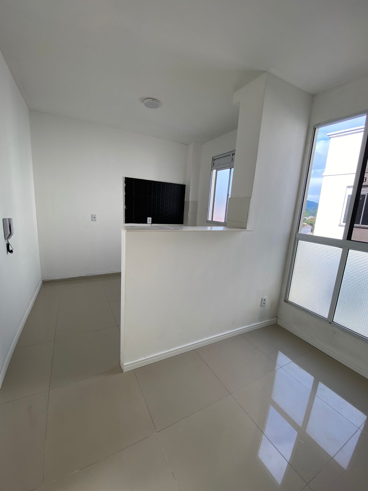 Apartamento à venda com 40m², 2 quartos, 1 vaga no bairro Vila Nova em Porto Alegre