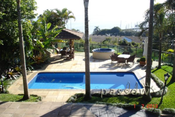 Casa à venda com 430m², 3 quartos, 2 suítes, 3 vagas no bairro Vila Assunção em Porto Alegre - Foto 30